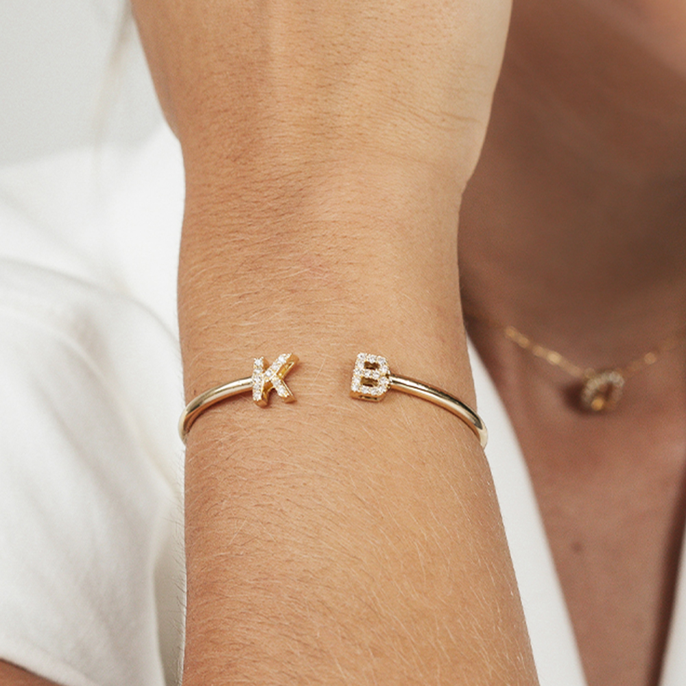 Pulseira Letras em Ouro Amarelo 18k com Diamantes